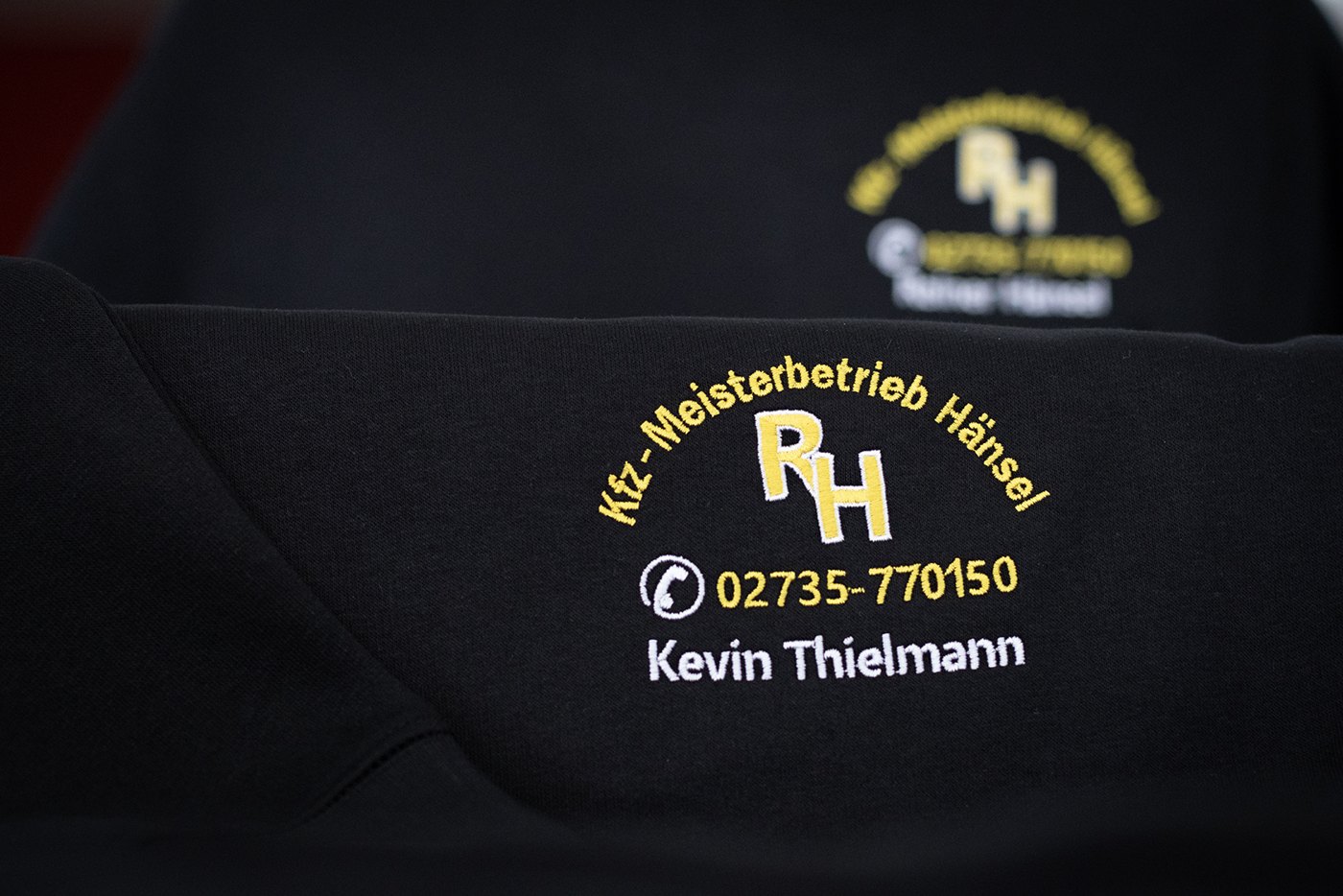 Sweatshirt mit Stickerei für Kfz-Meisterbetrieb Hänsel